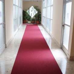 Passatoia boucle rosso (corridoio) Art 102 condominio via cenisio Milano